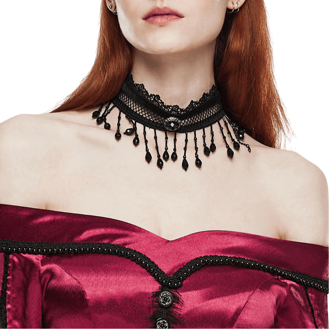 Victorian-inspired lace choker with black beads, elegant goth pearl tassel detail, perfect for vintage fashion lovers.