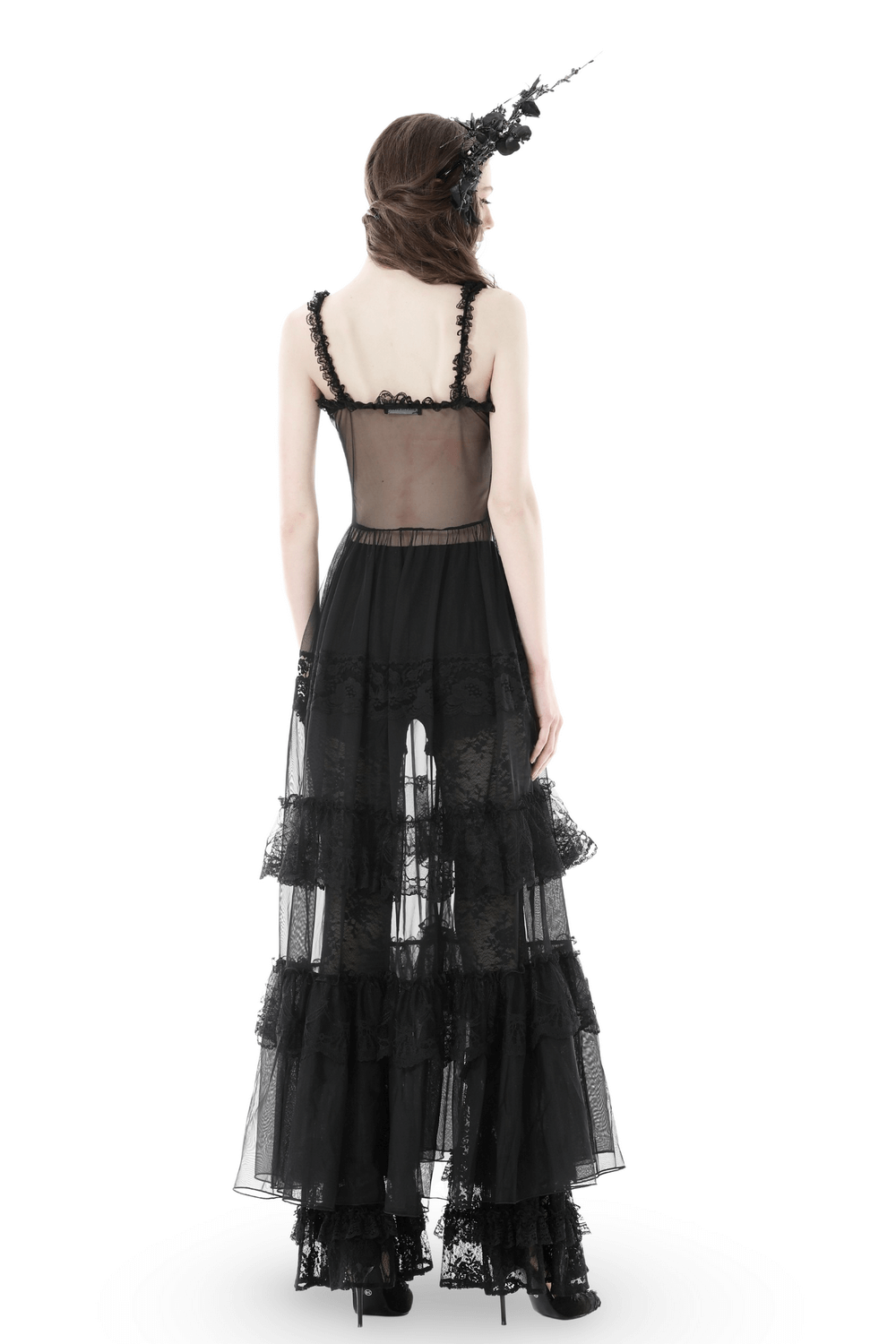 Back view of a dark Victorian lace dress with sheer panels and ruffled layers, perfect for gothic romance.