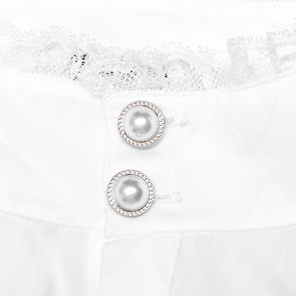 Close-up of elegant pearl buttons on a Victorian-inspired silky dress shirt, showcasing intricate detail and texture.