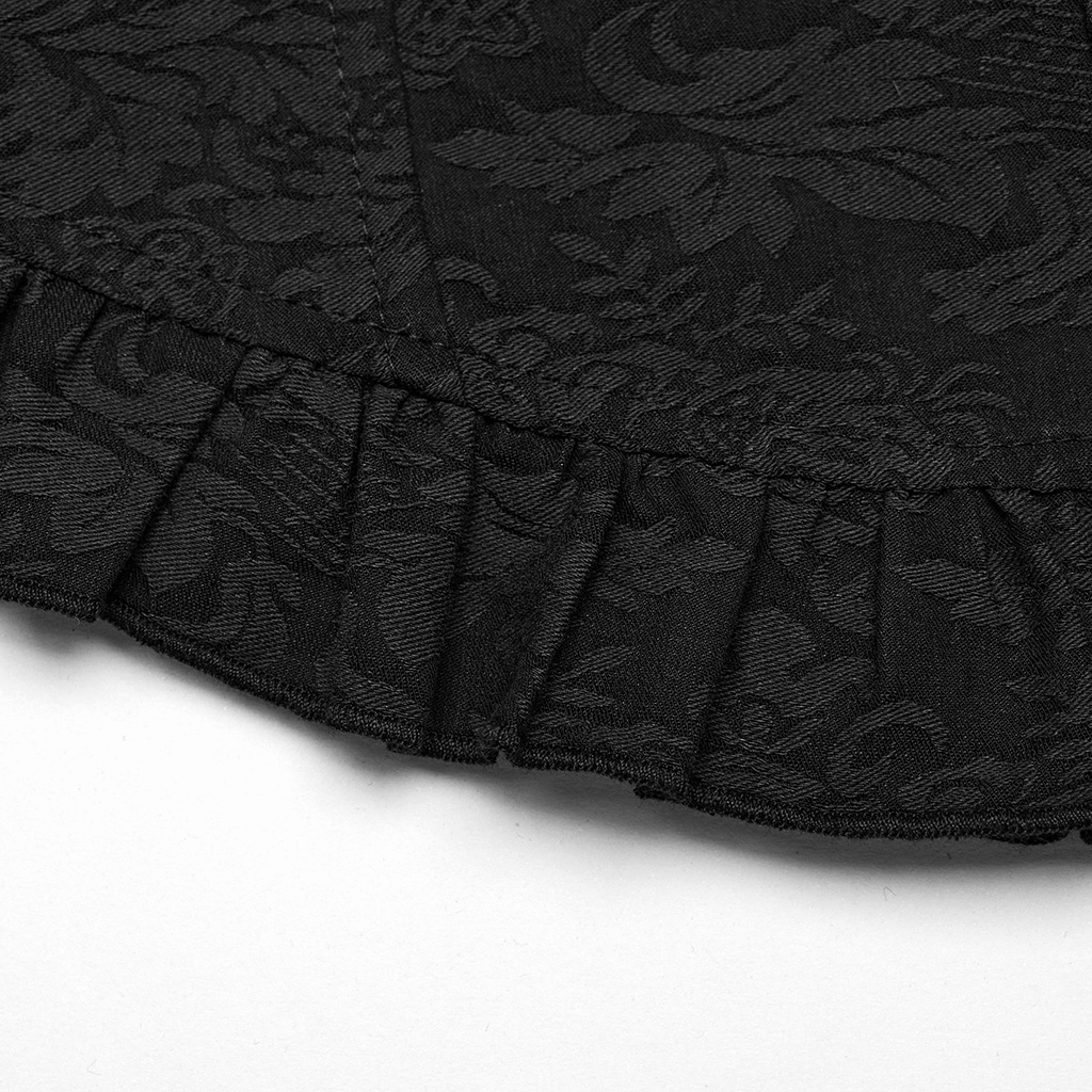 Close-up of Victorian-inspired black lace blouse with ruffle trim and jacquard fabric details.