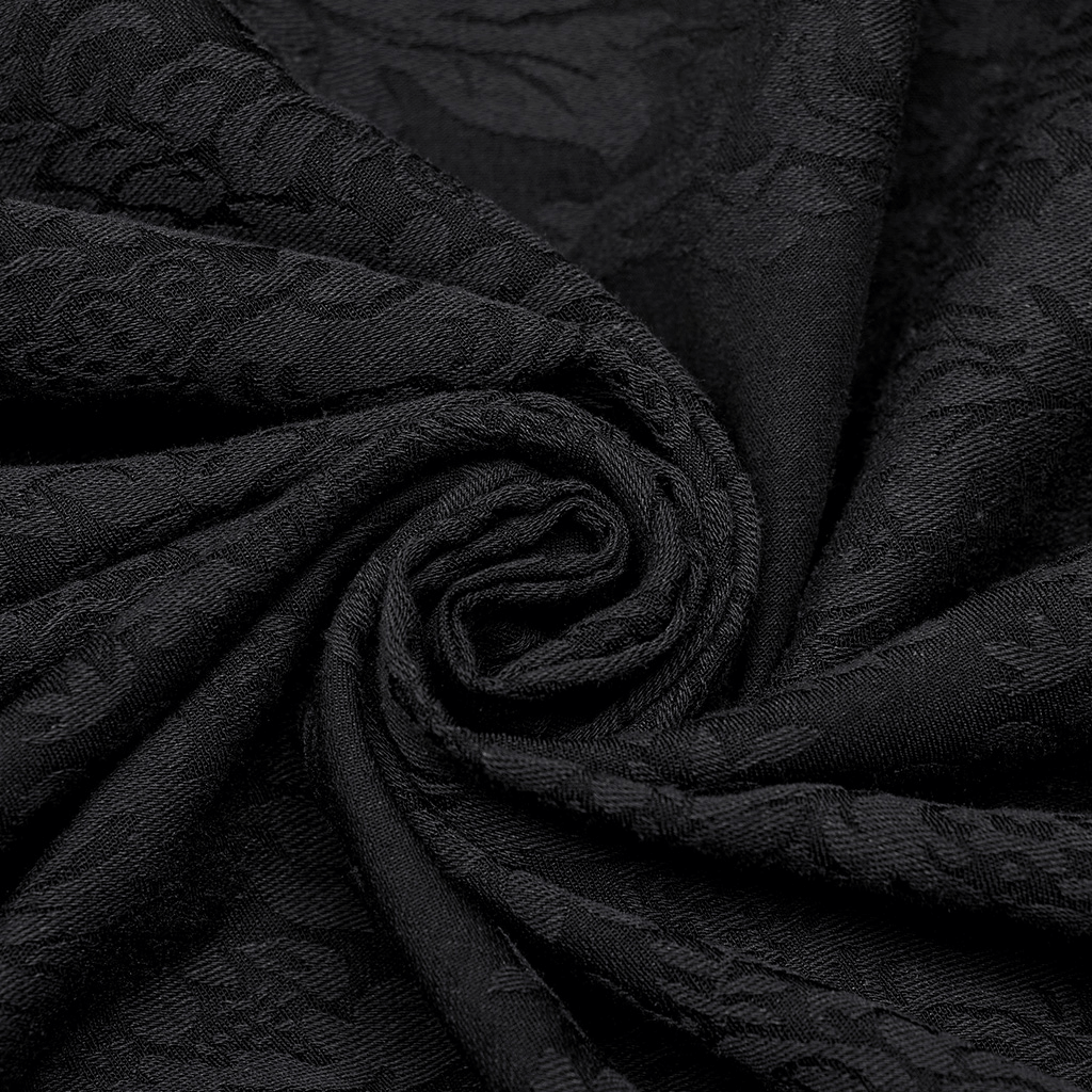 Close-up of luxurious black jacquard fabric with intricate floral patterns, perfect for Victorian-inspired styles.