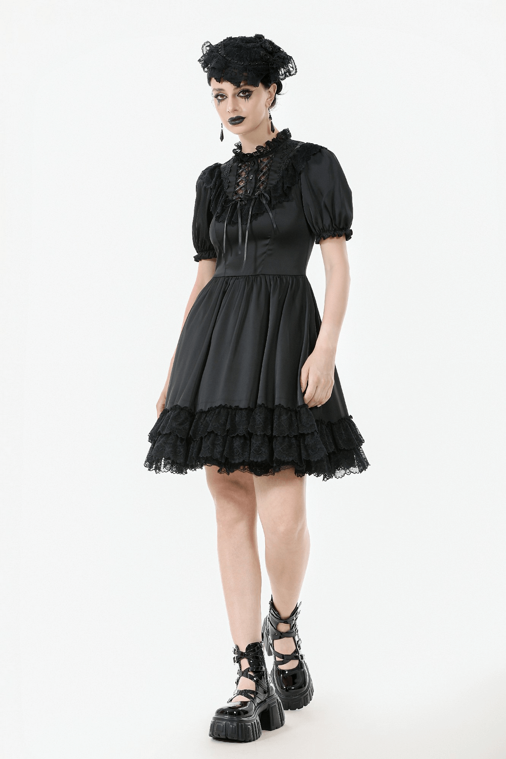 Victorian-inspired black satin dress with ruffled sleeves and lace trim, perfect for gothic fashion lovers.