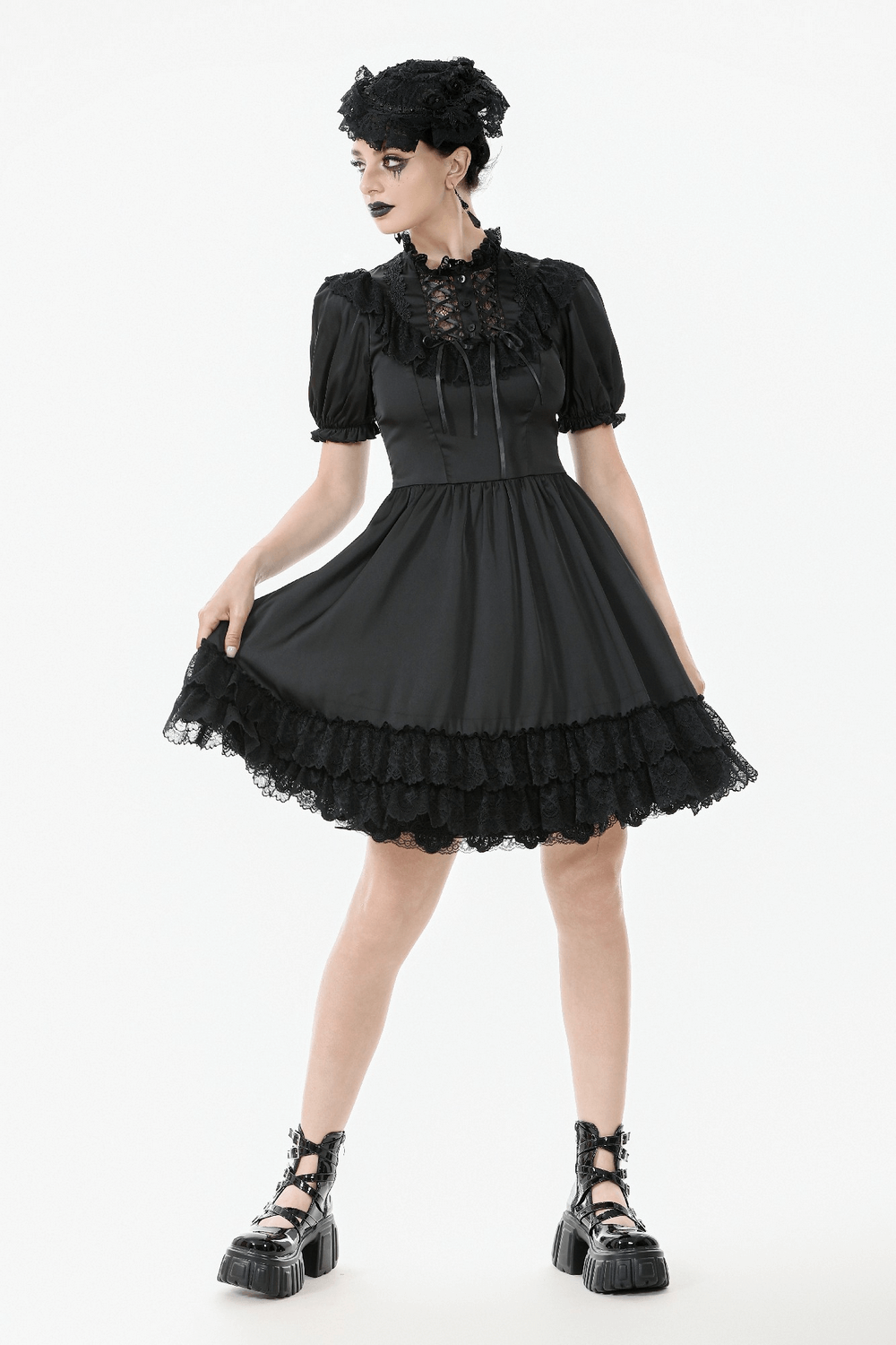 Victorian-inspired black satin dress with ruffled sleeves and lace trim, perfect for gothic elegance.