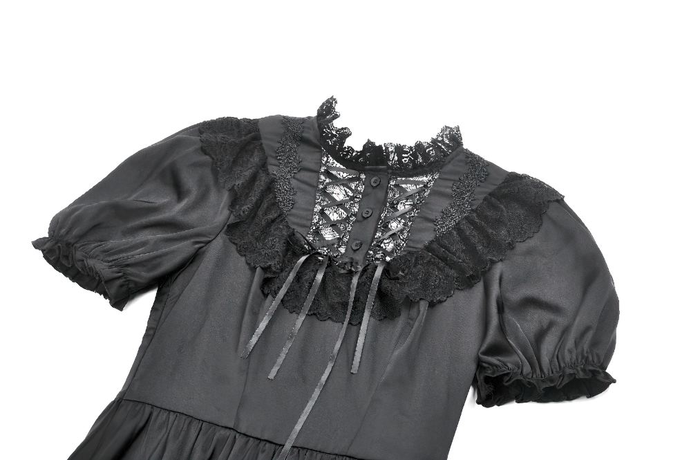 Victorian-inspired black satin dress with lace trim and ruffled sleeves, featuring a lace-up front and elegant silhouette.