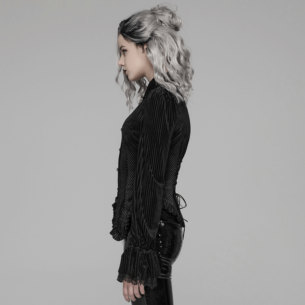 Victorian-inspired striped black velvet blouse with lace details and elastic cuffs, showcasing gothic fashion.