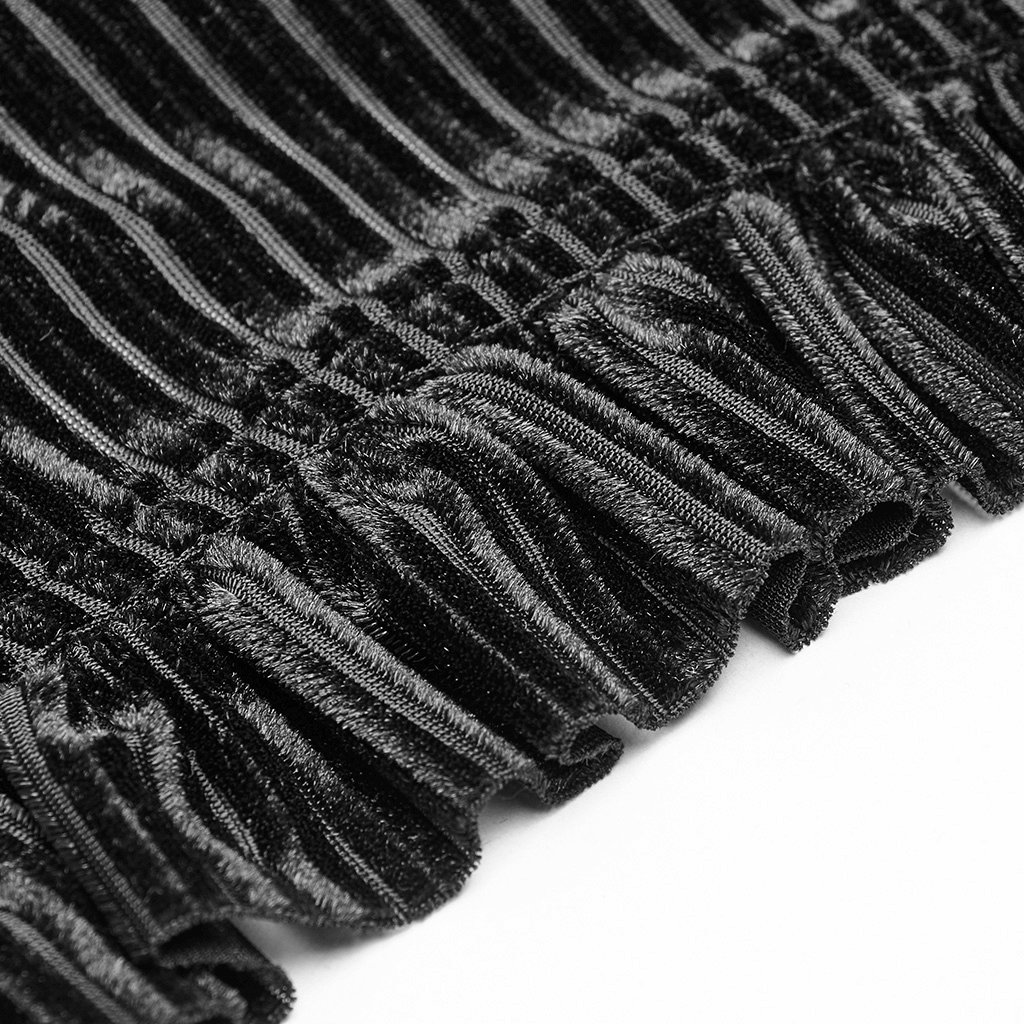 Close-up of luxurious black striped velvet fabric with ruffled edges, perfect for a Victorian-inspired blouse.