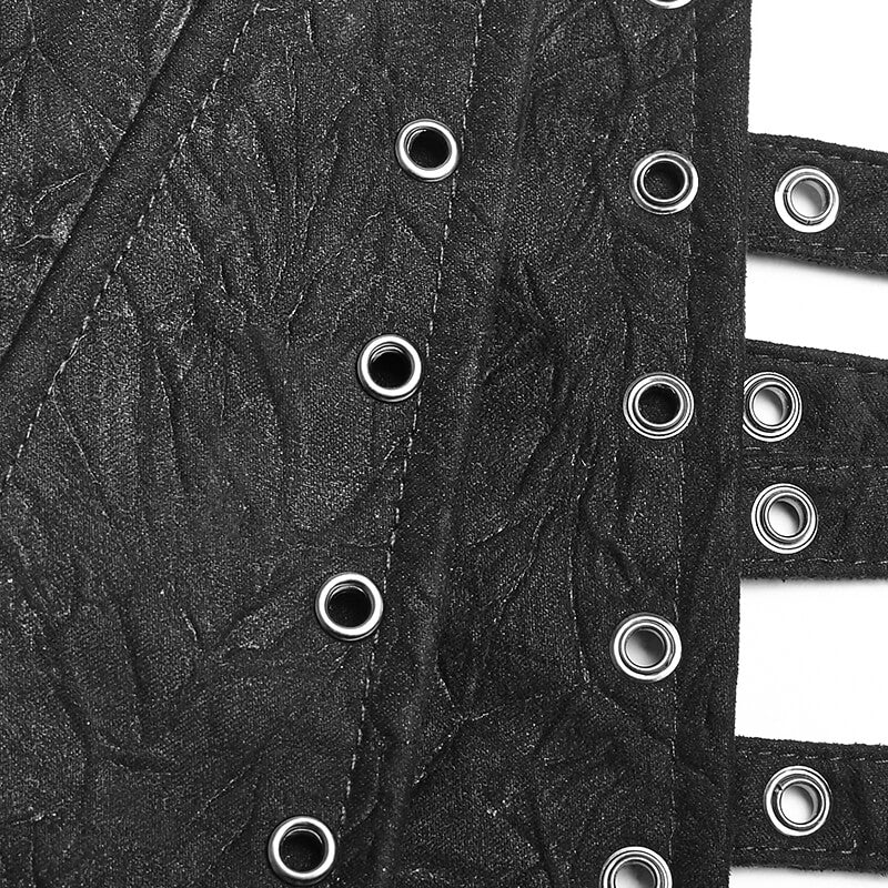 Close-up of a Victorian-inspired corset belt showcasing studded loops and metallic grommets in distressed black fabric.