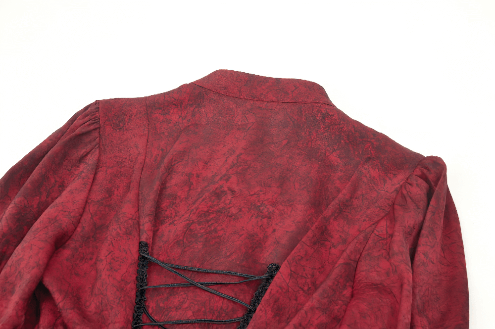 Elegant Victorian-inspired wine red blouse with corset-style lacing at the back and dramatic ruffled design.