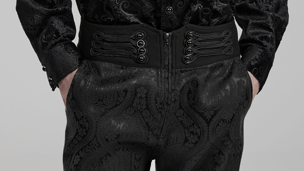 Close-up of Victorian-inspired Gothic men's trousers featuring intricate jacquard fabric and unique waist decoration.