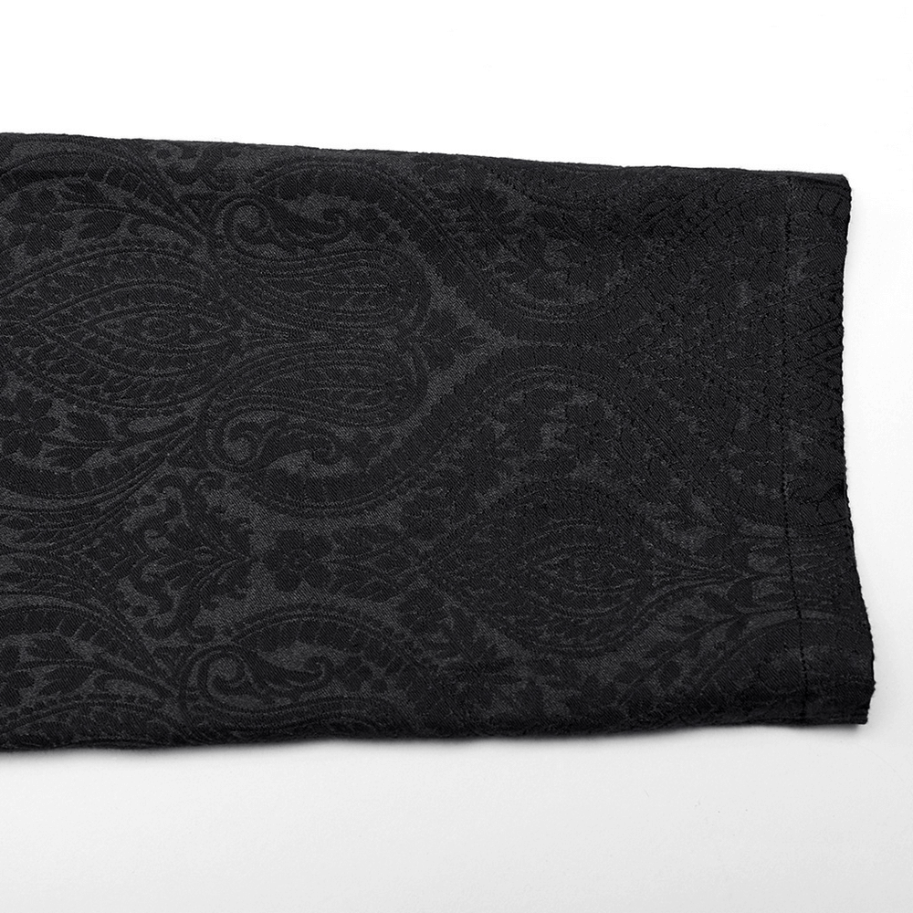 Close-up of Victorian jacquard fabric pattern, showcasing intricate detailing in gothic style.