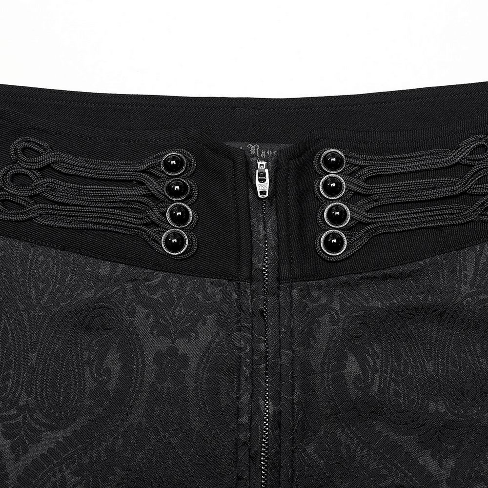 Close-up of Victorian Jacquard Twill Goth Men's Trousers featuring decorative buttons and zipper detail.