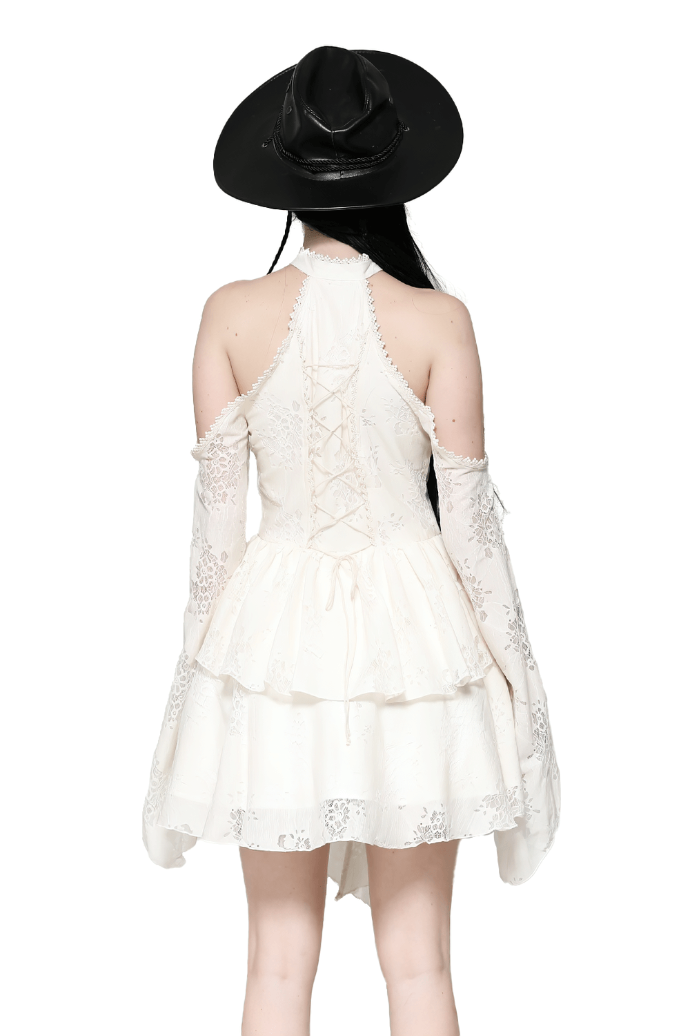 Back view of a beige Victorian lace dress with open shoulders and tiered bell sleeves, paired with a black hat.