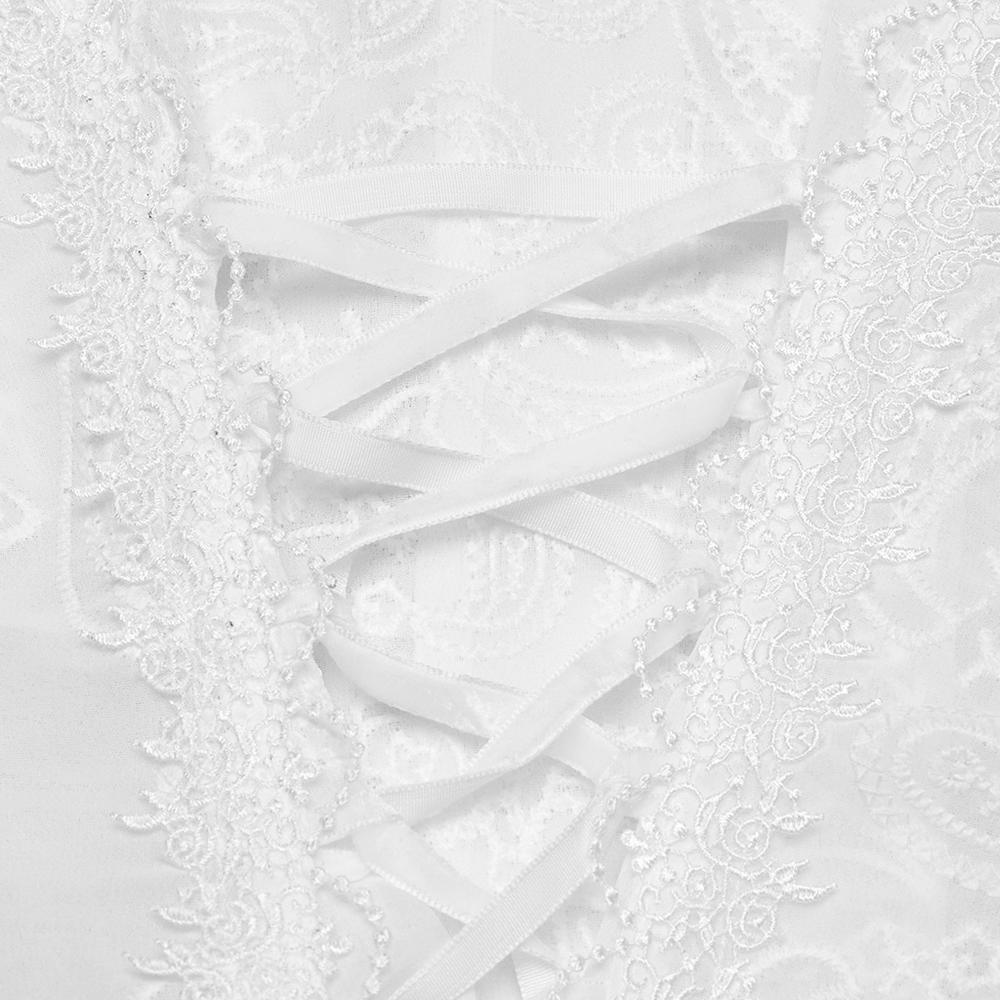 Close-up of Victorian lace embroidery and ribbon detailing on a chiffon blouse, showcasing delicate craftsmanship.