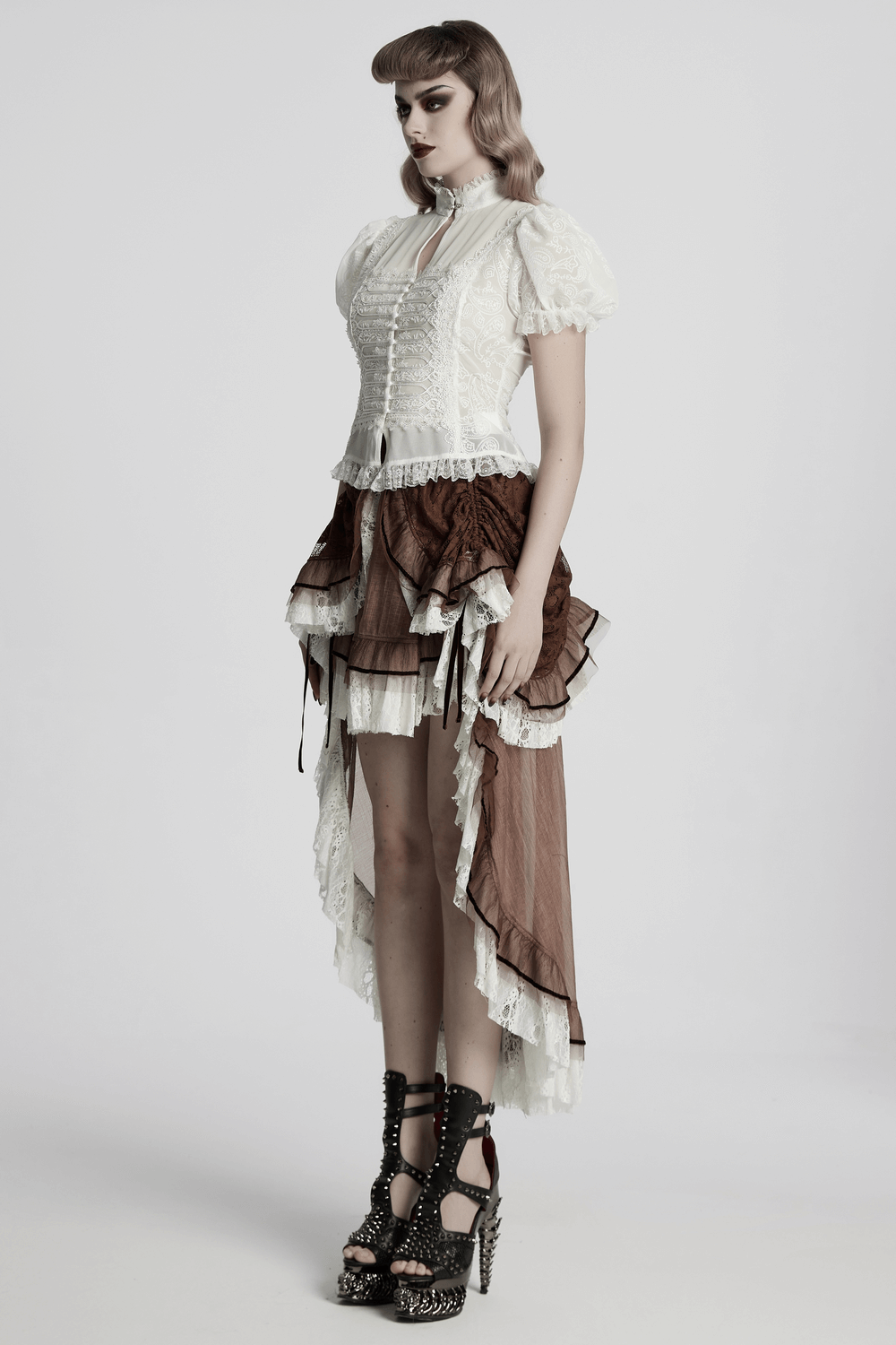 Elegant Victorian lace embroidered chiffon blouse for women, styled with a high-low skirt and striking platform heels.