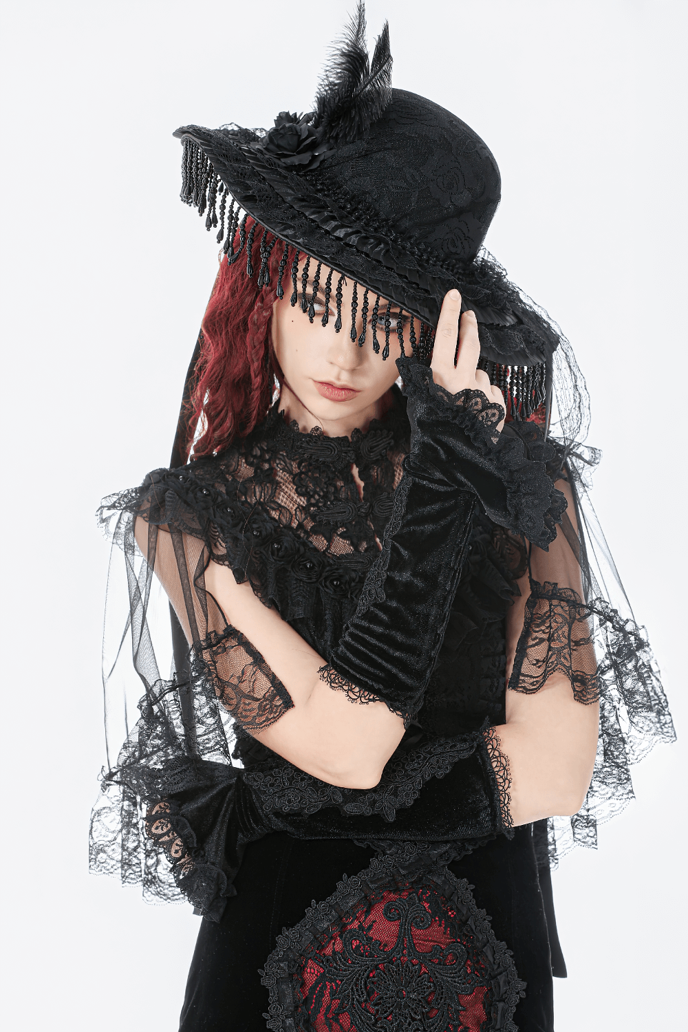 Victorian Lace Hat with Feather and Beaded Fringe worn by model, showcasing gothic elegance and dramatic flair.