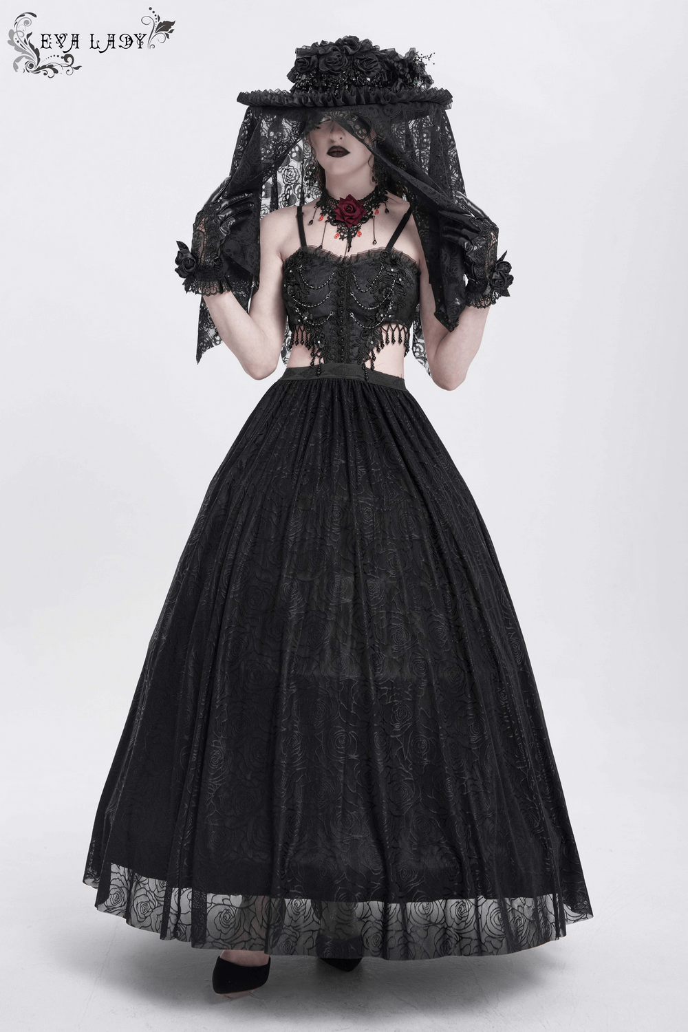 Victorian lace mourning hat with floral details and mesh, styled for gothic elegance in dark fashion.