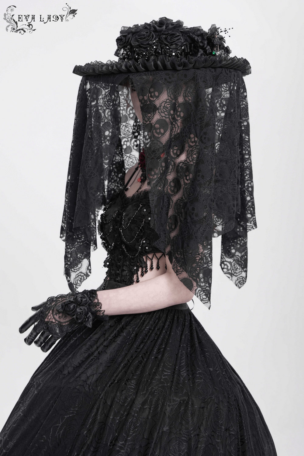Gothic Victorian lace mourning hat with floral details and skull veil, perfect for dark fashion and events.