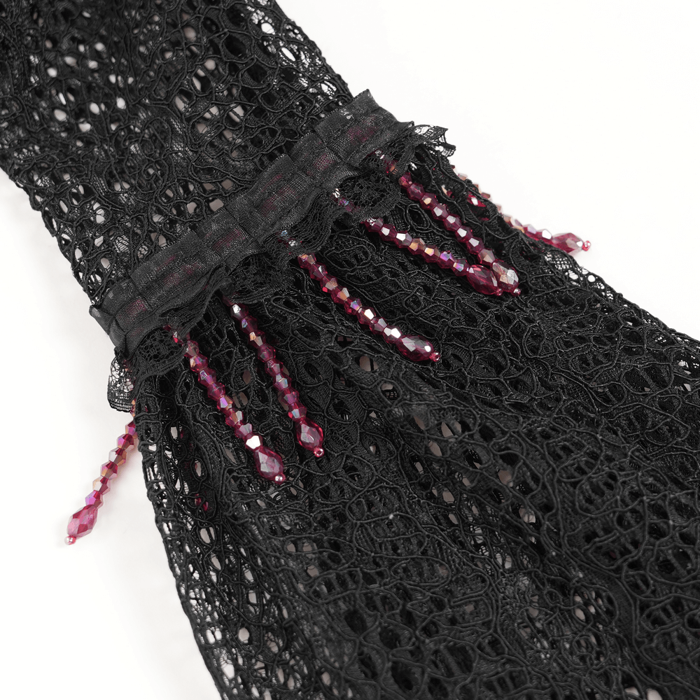 Intricate lace detail with deep crimson beads from the Victorian Lace Ruffled Gothic Cape with Corset Detail.