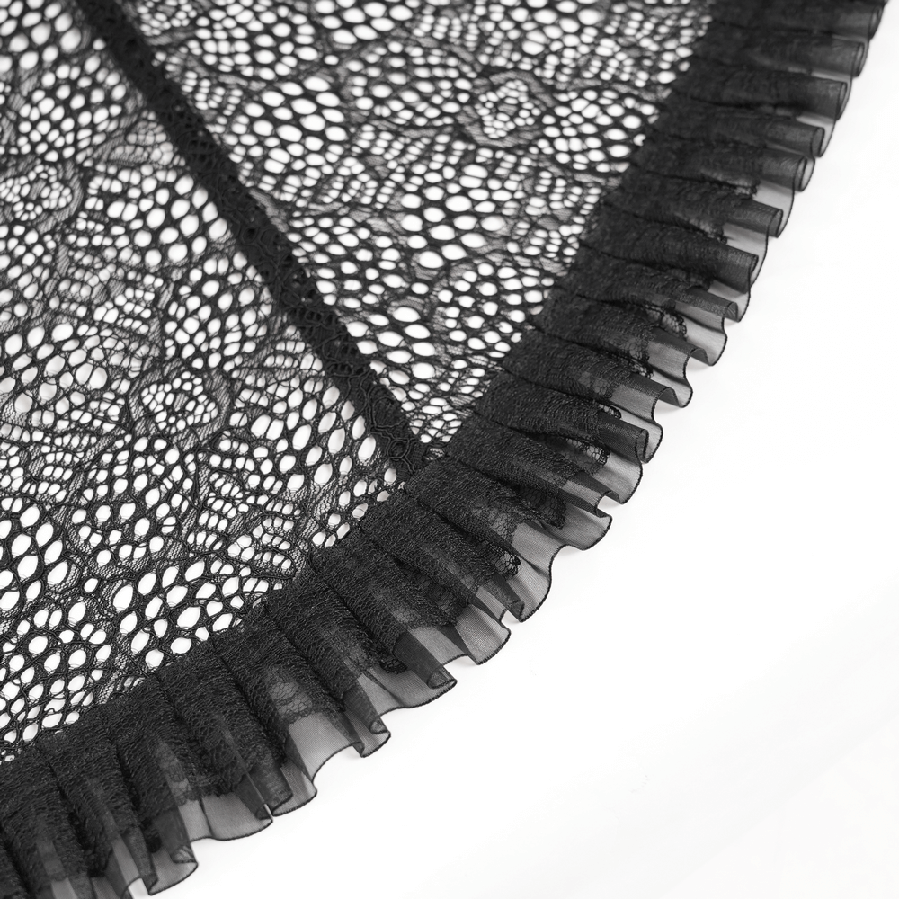 Victorian Lace Ruffled Gothic Cape with Corset Detail lace fabric featuring intricate ruffles and fine details.
