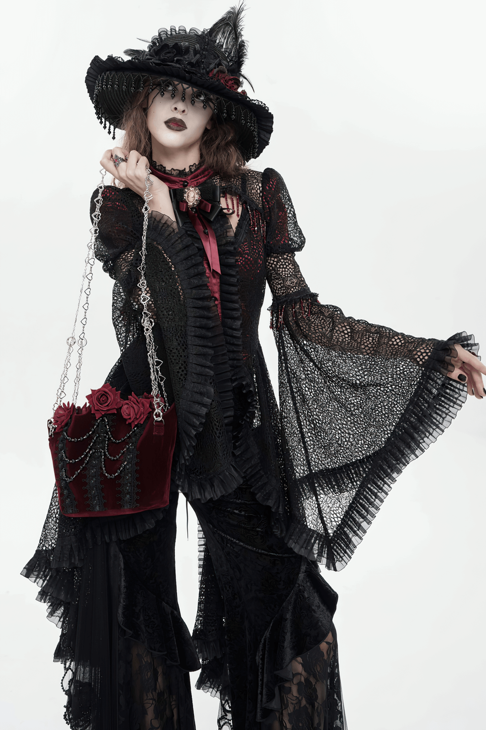 Victorian Lace Ruffled Gothic Cape with Corset Detail worn by a model in a stylish ensemble.