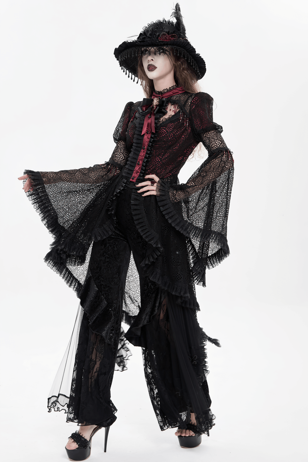 Victorian Lace Ruffled Gothic Cape with Corset Detail worn with a stylish hat and elegant accessories.