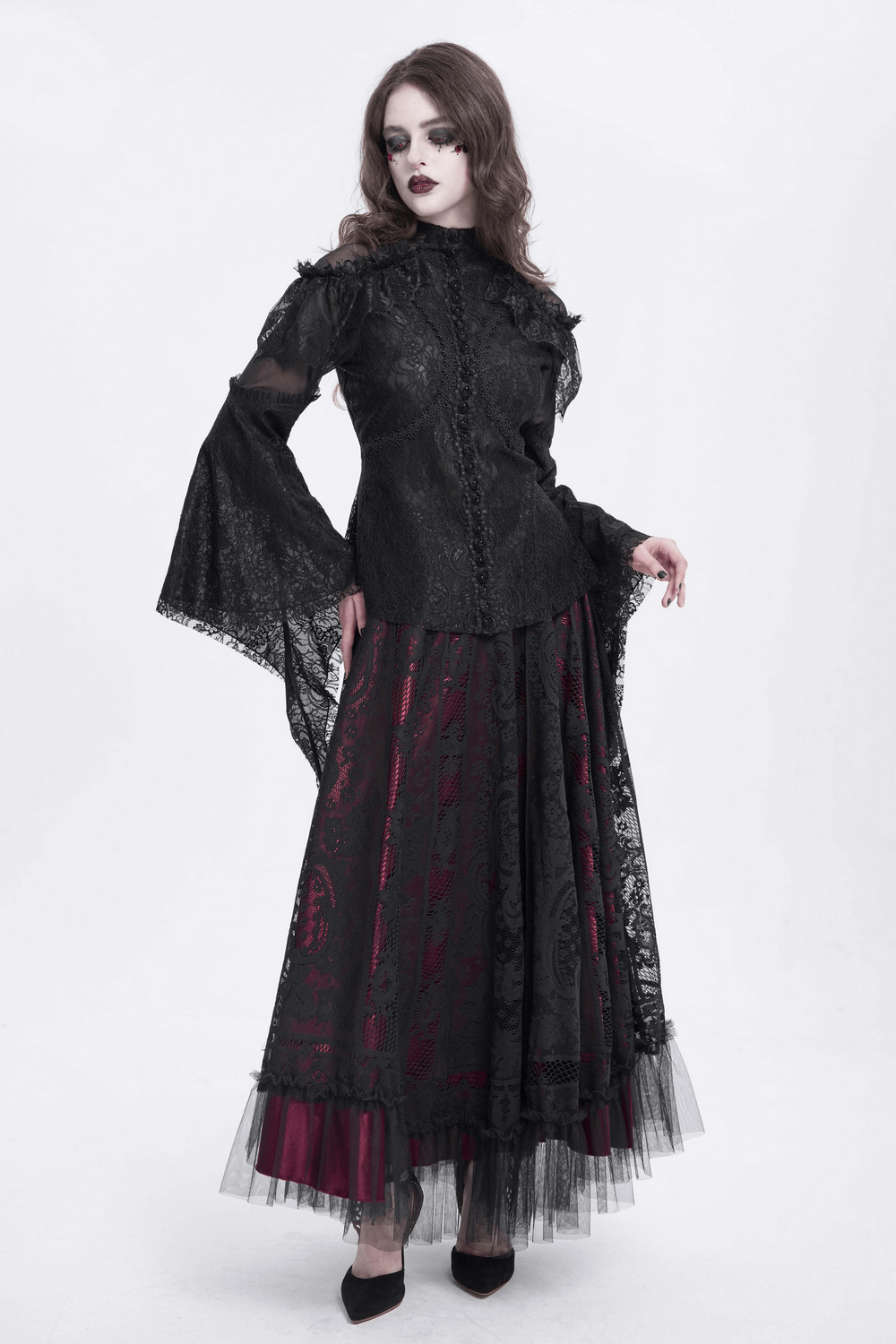 Victorian lace top with ruffled sleeves, high collar, and dramatic bell sleeves, styled with a gothic skirt.