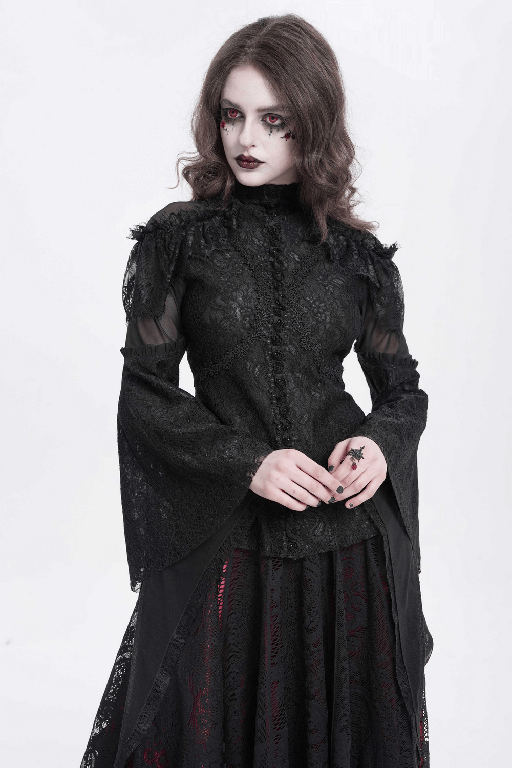 Victorian lace top with ruffle details, sheer panels, and long bell sleeves, perfect for gothic fashion enthusiasts.