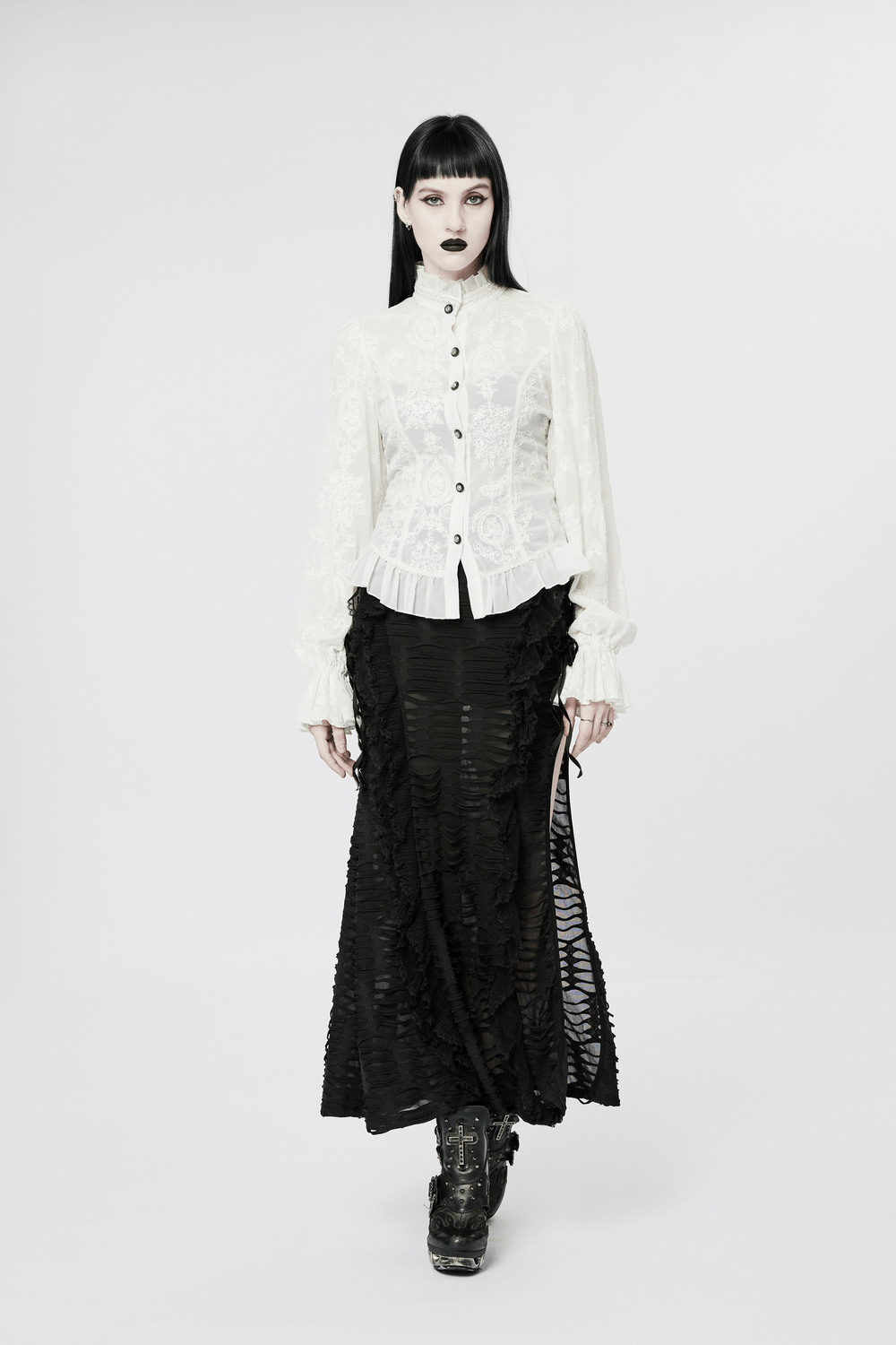 Victorian lace-up back blouse in white chiffon, paired with a dramatic black ruffled skirt, exuding gothic elegance.