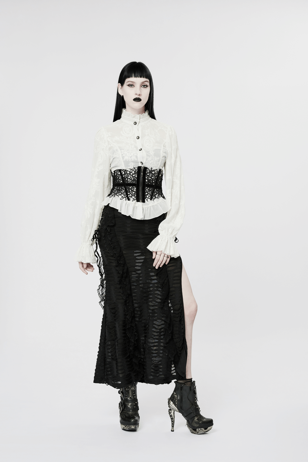 Gothic lace-up back blouse with dramatic sleeves, fitted silhouette, and vintage-inspired details. Perfect for elegant gothic fashion.