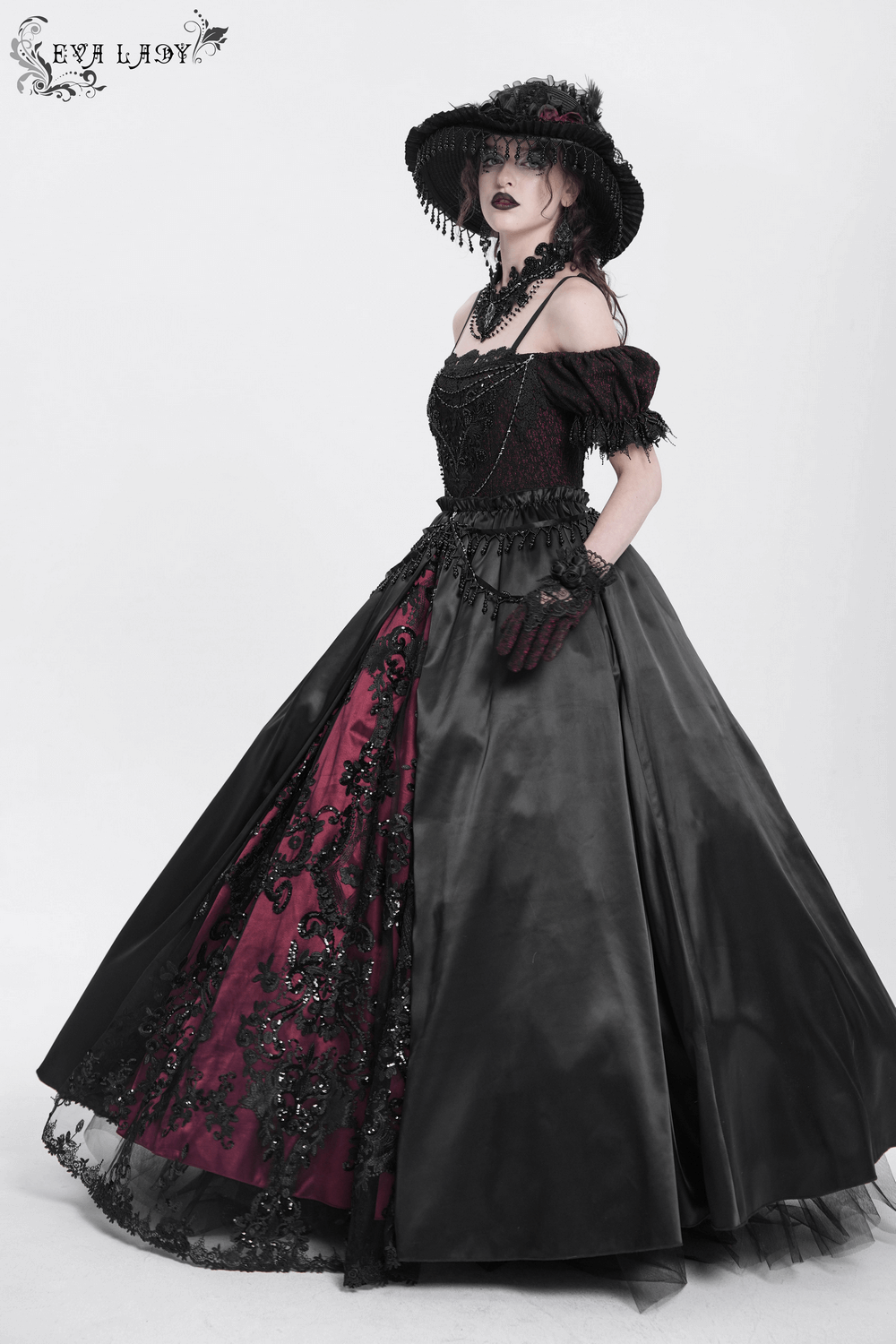 Victorian lace-up dress in black and burgundy with ruffles, beaded detail, and elegant gothic style.