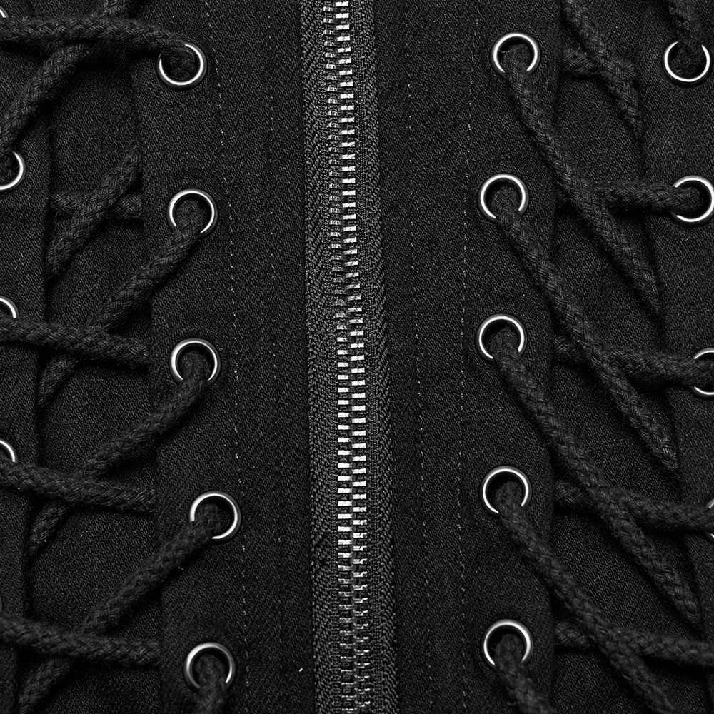 Close-up of Victorian lace-up gothic jacket with eyelet details and zipper, showcasing chic punk style.