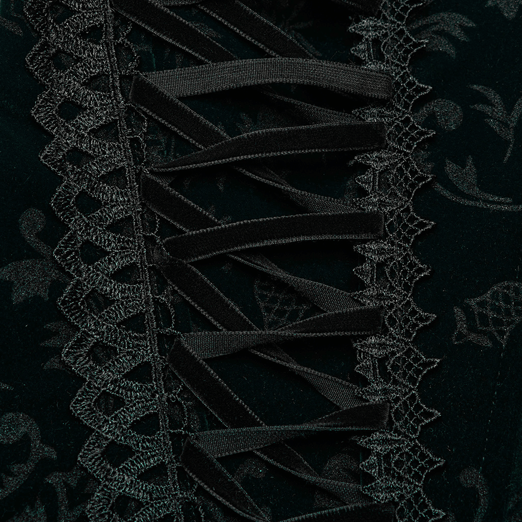 Close-up of elegant lace and velveteen drawstrings on a gothic corset, showcasing intricate details.
