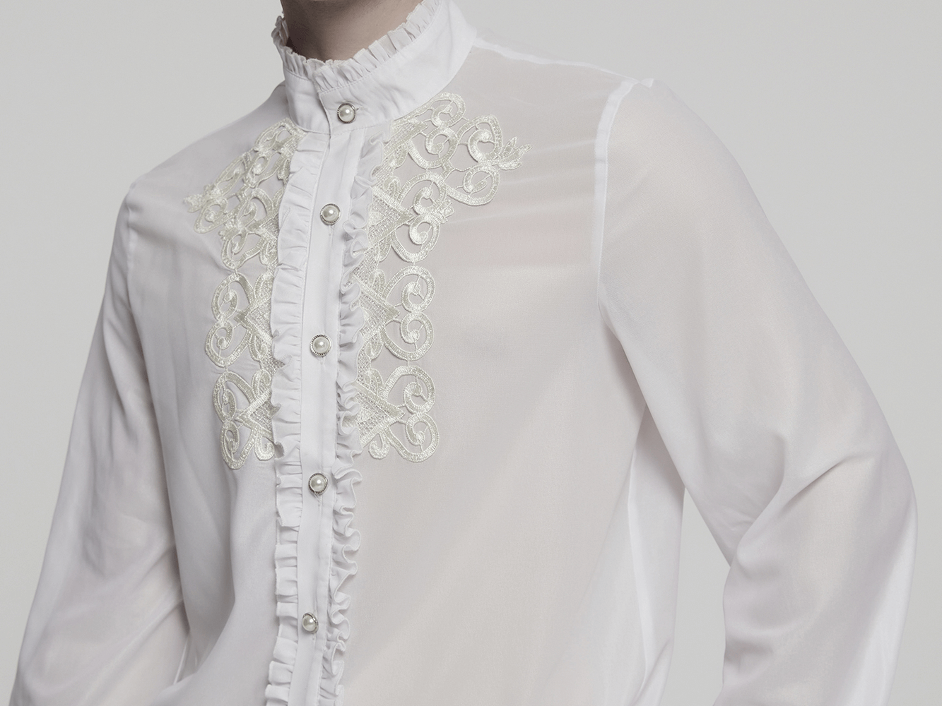 Victorian ruffle shirt in white chiffon with embroidery and gem buttons, perfect for gothic fashion and period styling.