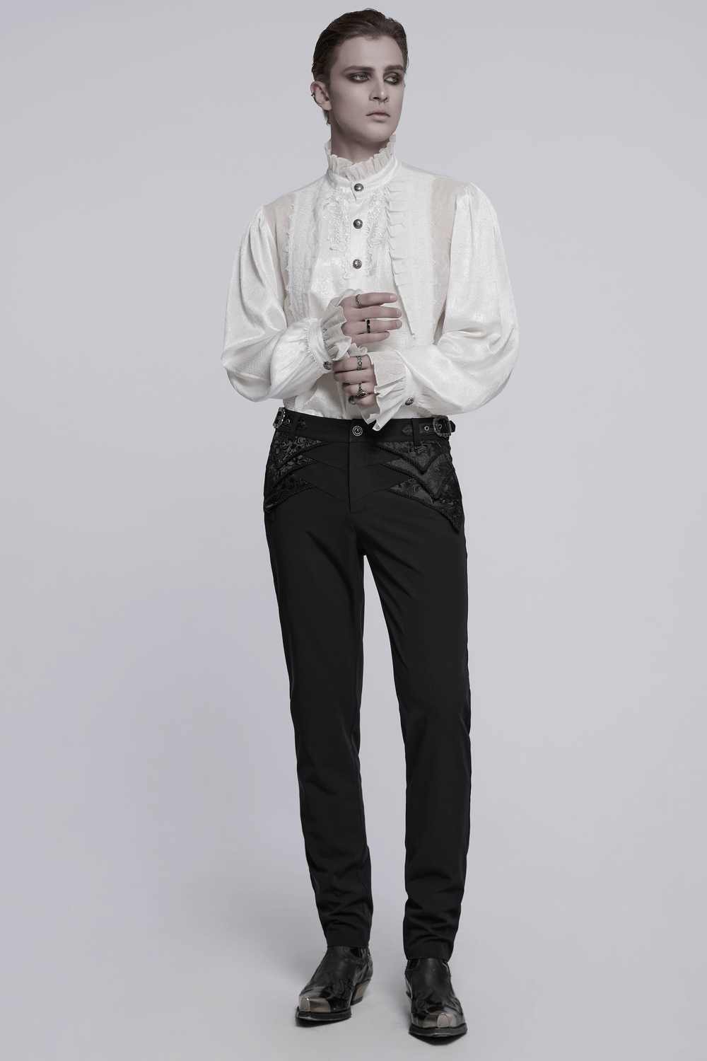 Victorian ruffled white shirt with gothic buttons and lace patchwork, perfect for an elegant gothic look.