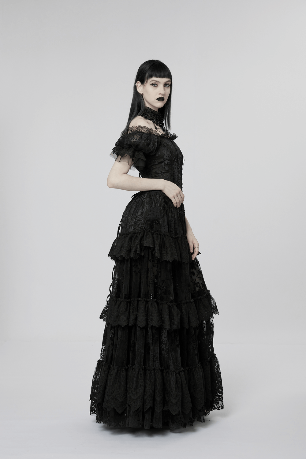 Victorian short sleeved black lace gown showcasing Gothic elegance with layered design and exquisite detailing.
