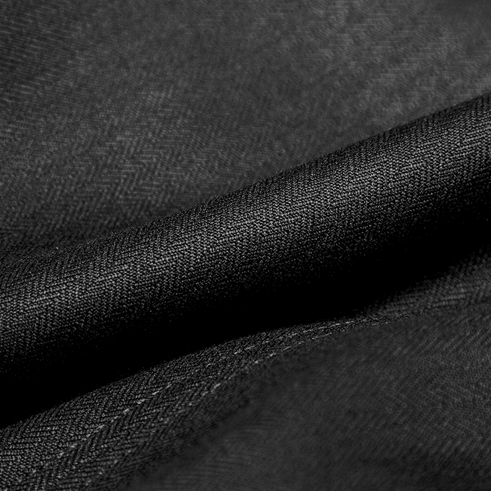 High-quality woven suit fabric in black, featuring a stylish herringbone pattern for elegant garments.