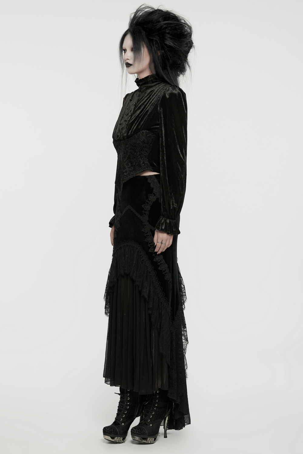 Victorian velvet gothic blouse with rose buttons, showcasing a retro goth silhouette and elegant styling.