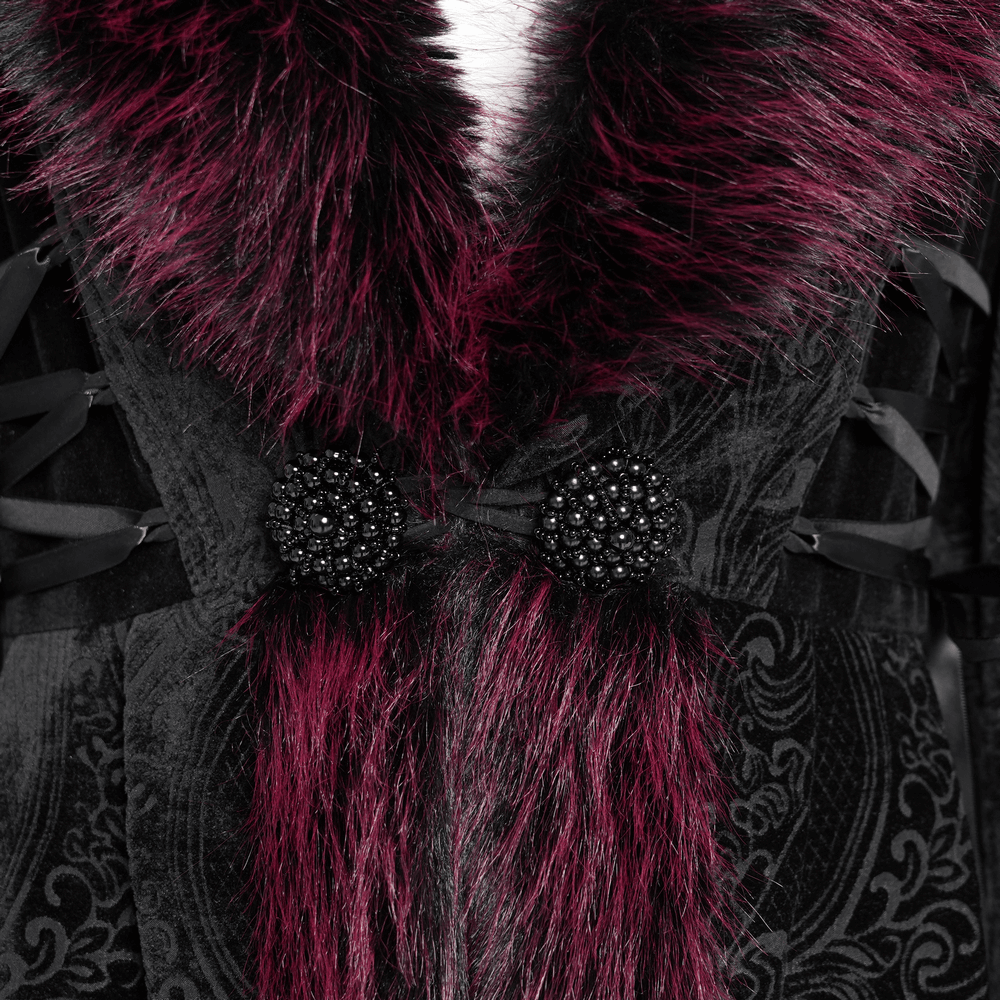 Close-up of vintage black velvet coat with burgundy faux fur trim and intricate lace details, perfect for gothic elegance.