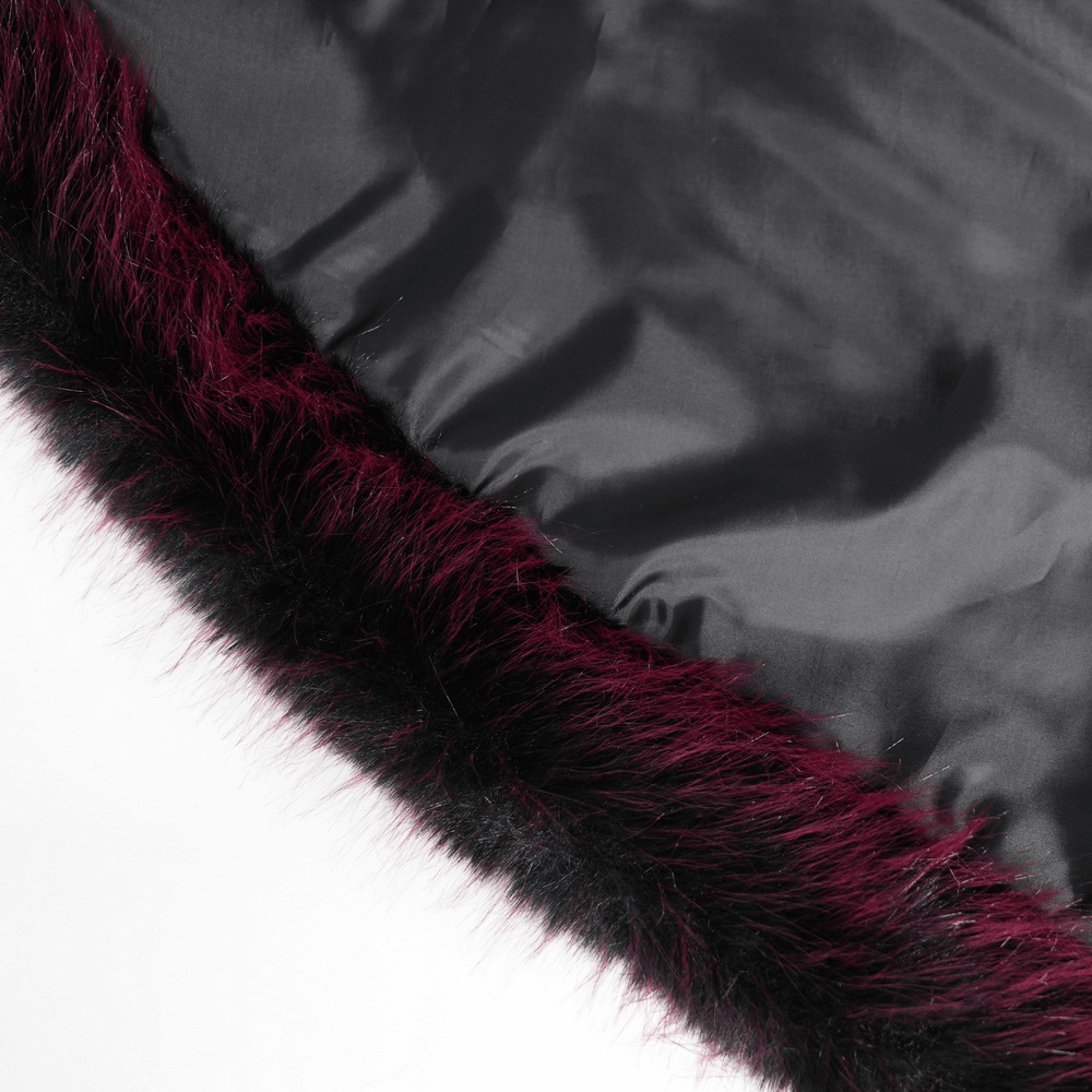 Close-up of burgundy faux fur trim on a vintage black velvet coat, showcasing its luxurious texture.