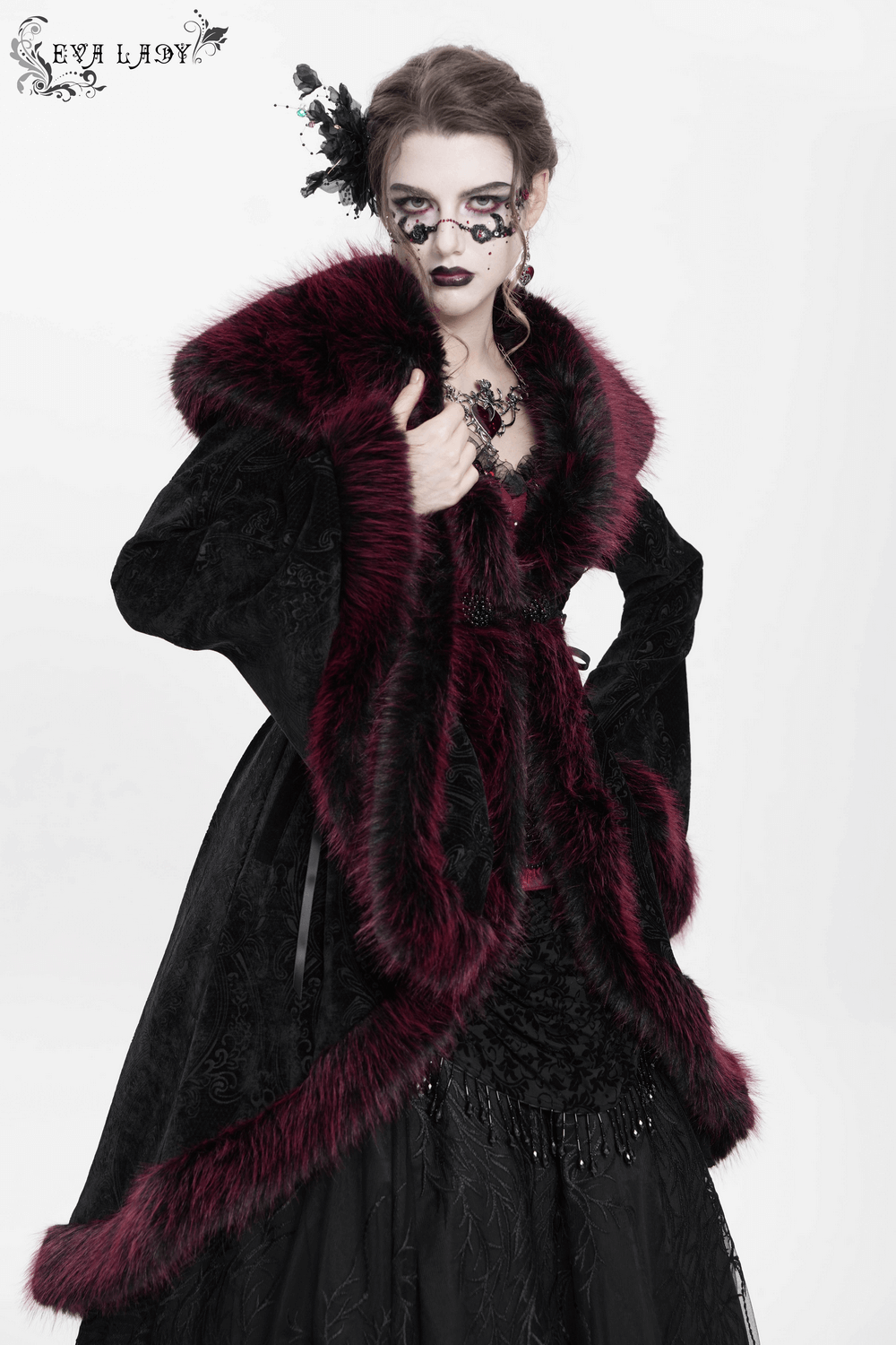 Elegant vintage black coat with burgundy faux fur trim, showcasing gothic style and intricate lace details.