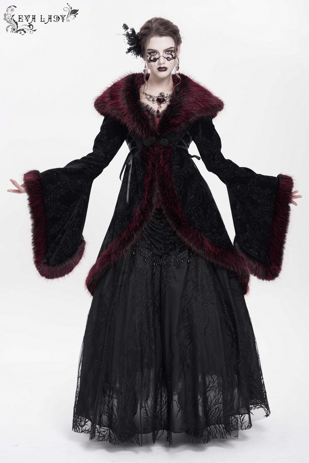 Elegant vintage black coat with burgundy faux fur trim, featuring intricate lace and dramatic sleeves.