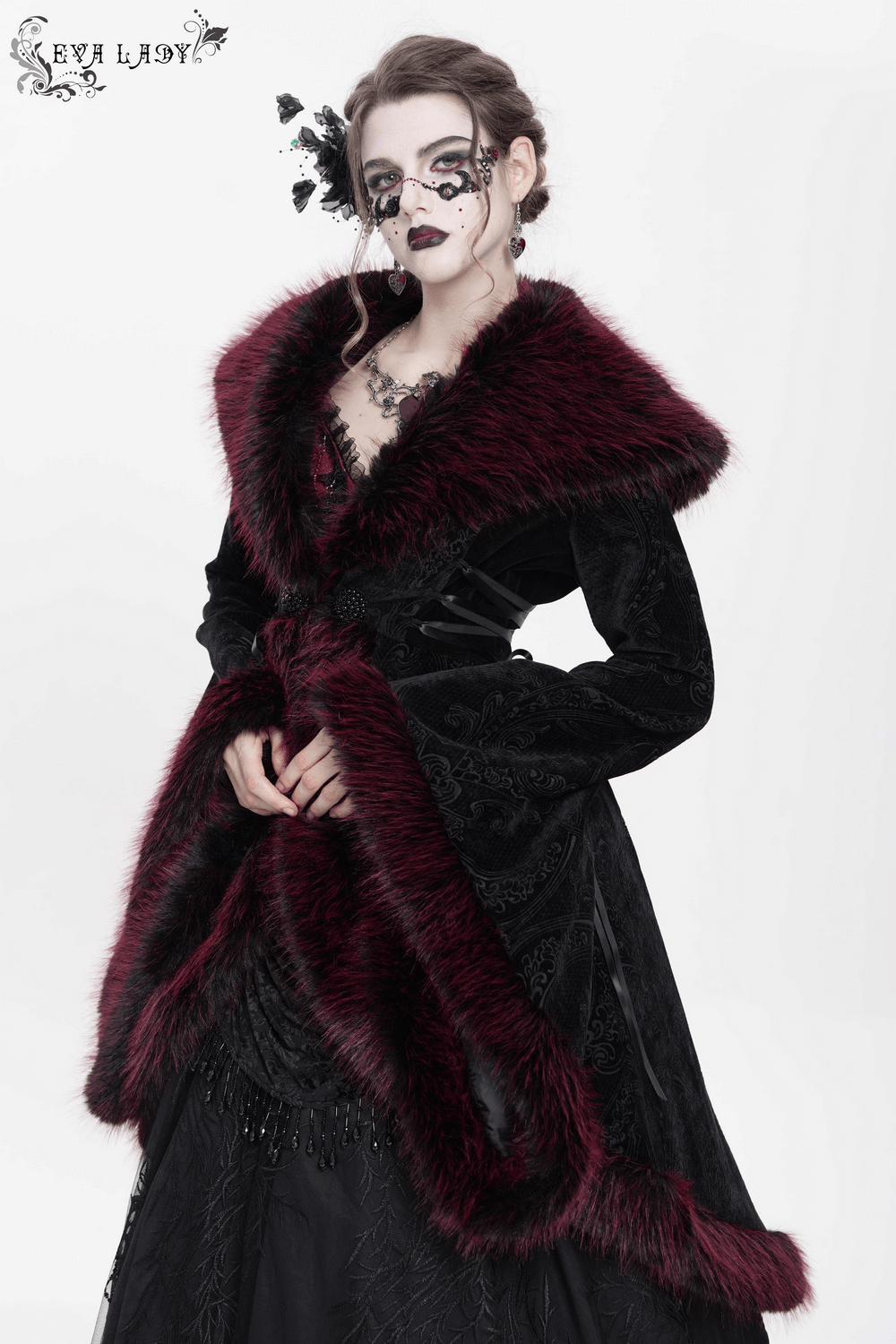 Elegant vintage black coat with burgundy faux fur trim, showcasing gothic style and intricate lace details.