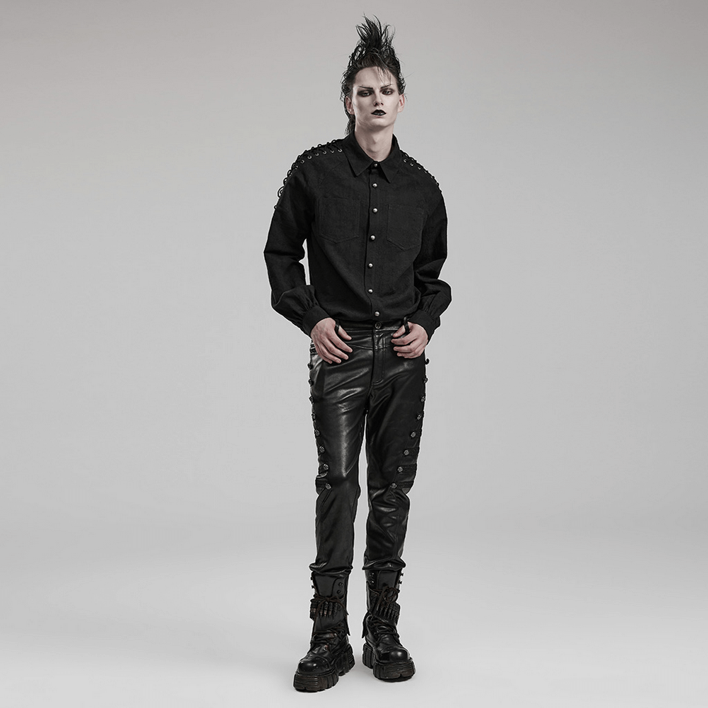 Men's vintage black lace-up gothic shirt with stylish lace details, paired with black leather pants and boots.