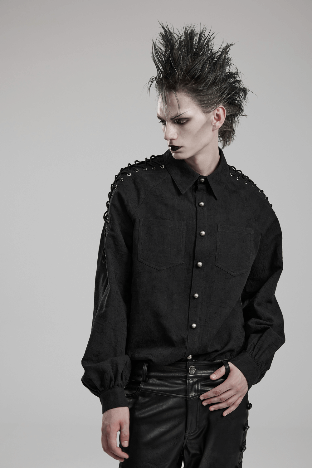 Stylish men’s vintage black lace-up gothic shirt with unique shoulder eyelet detail and hand-sewn buttons.