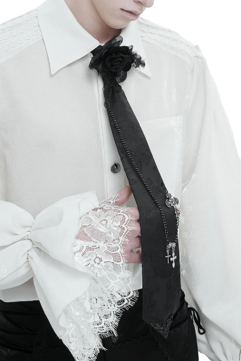 Vintage black male necktie with cross pendant and rose, perfect gothic accessory for a bold statement.