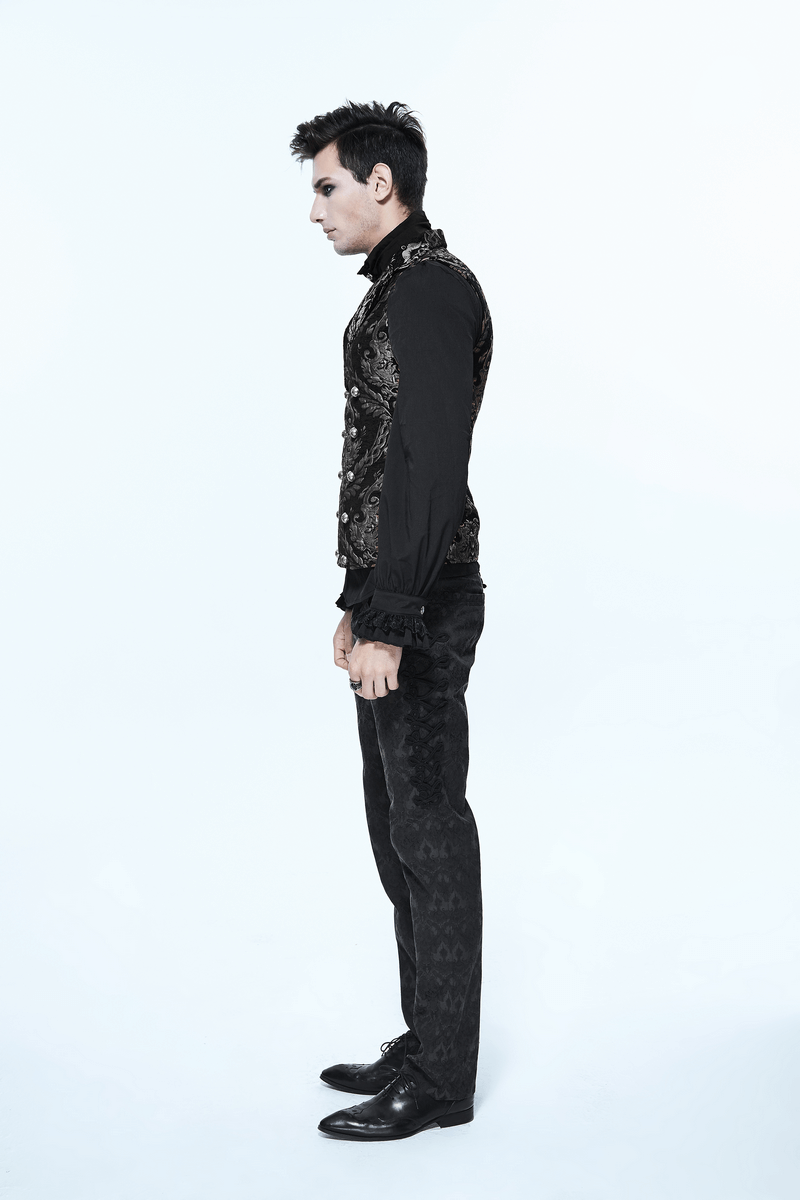 Stylish man wearing a vintage black waistcoat with golden filigree, showcasing alternative gothic fashion.