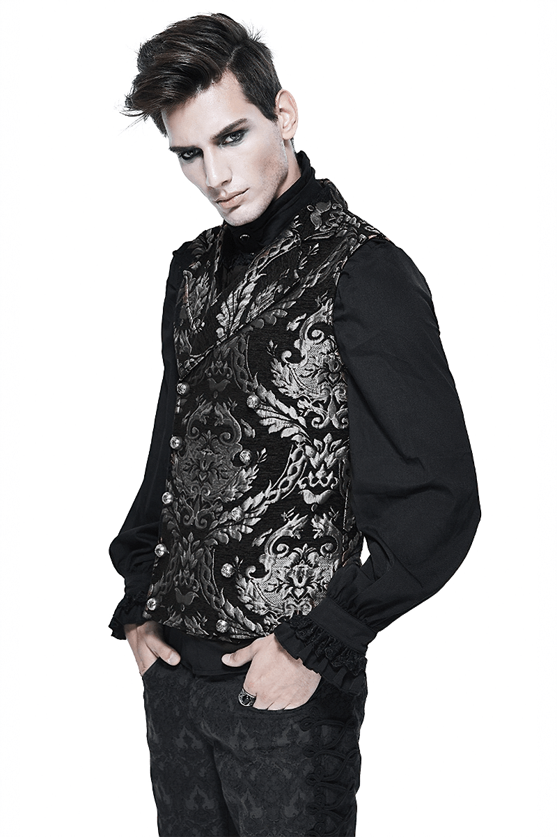 Male model in a vintage black waistcoat with silver filigree, styled for gothic fashion.