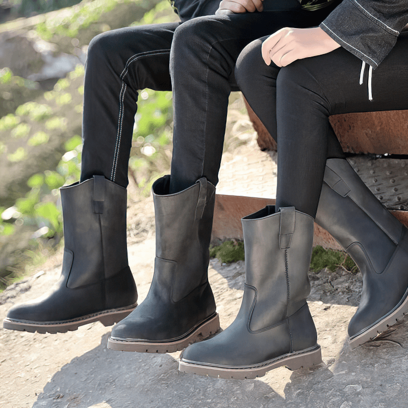 Men's vintage buckle boots in black leather, perfect for casual rock style outfits.