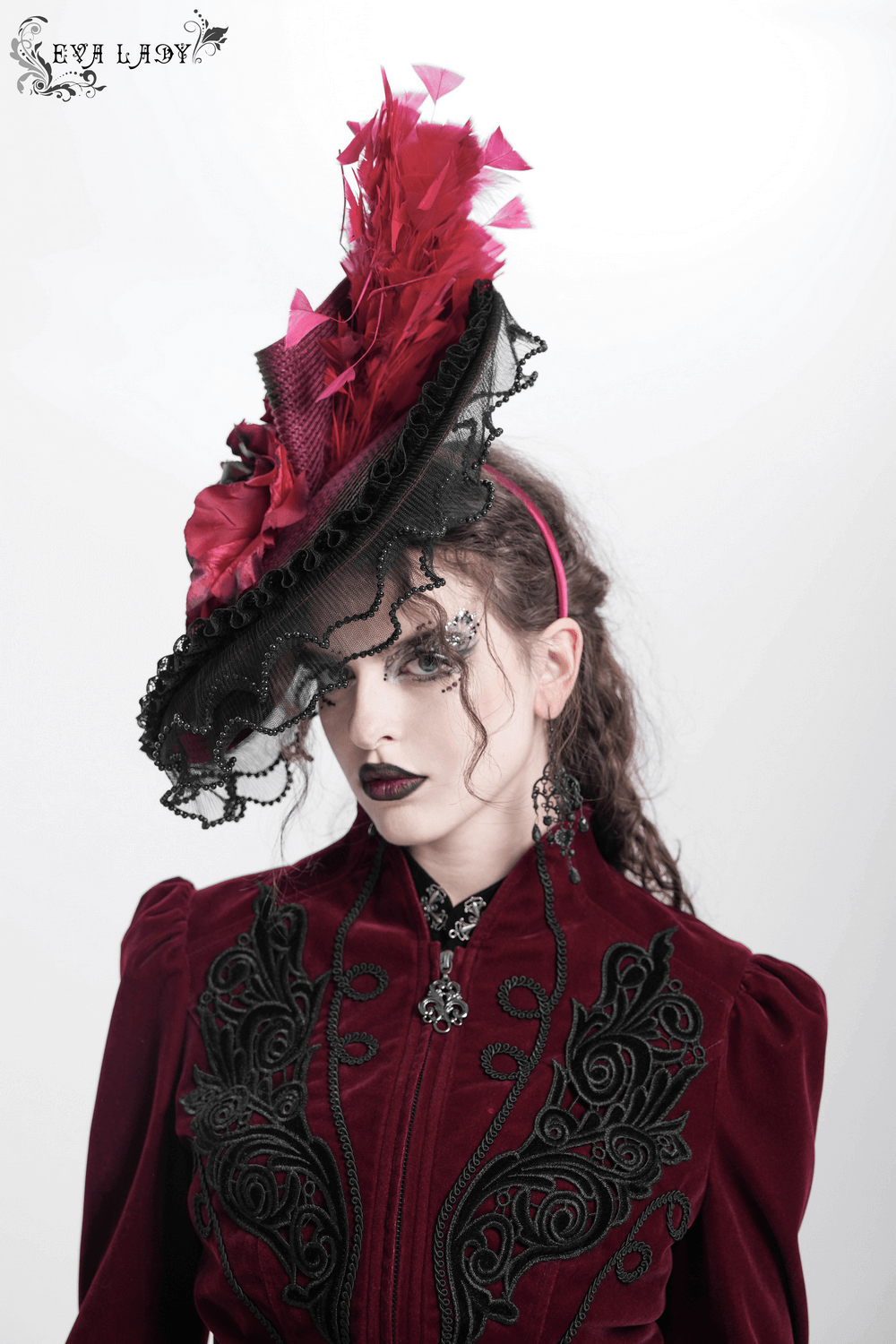 Vintage burgundy and black fascinator hat with feathers and lace, perfect for gothic events and special occasions.