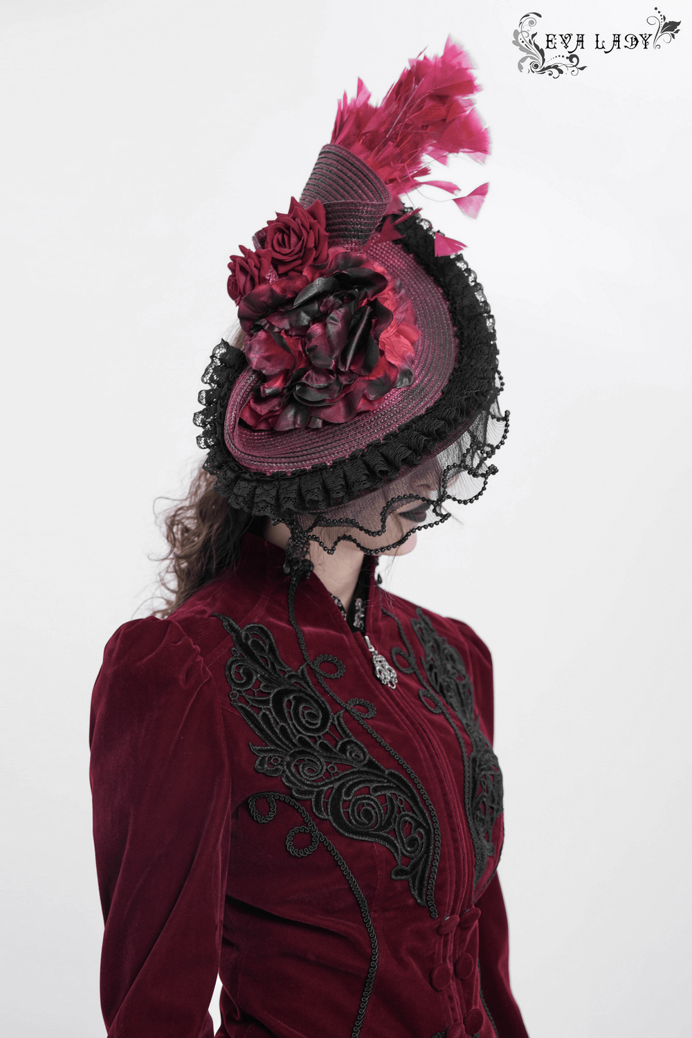 Vintage burgundy and black fascinator hat with feathers and lace details, perfect for gothic occasions.